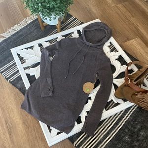 Akini soft purple sweater in size small.  New with tags.